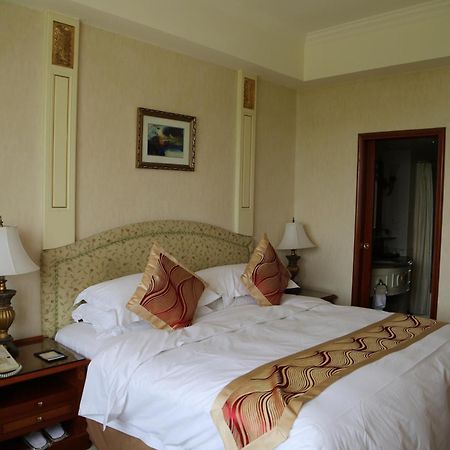 Huiquan Dynasty Hotel Ціндао Номер фото