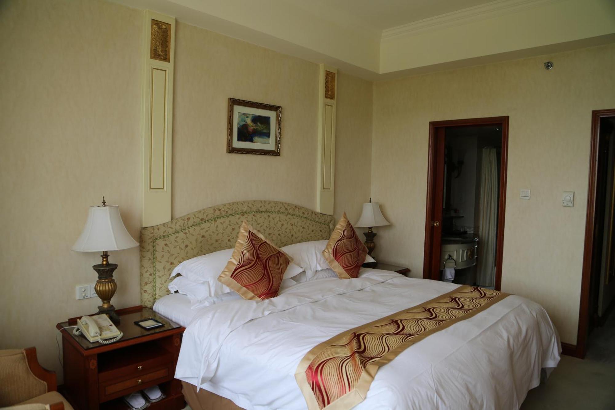 Huiquan Dynasty Hotel Ціндао Номер фото