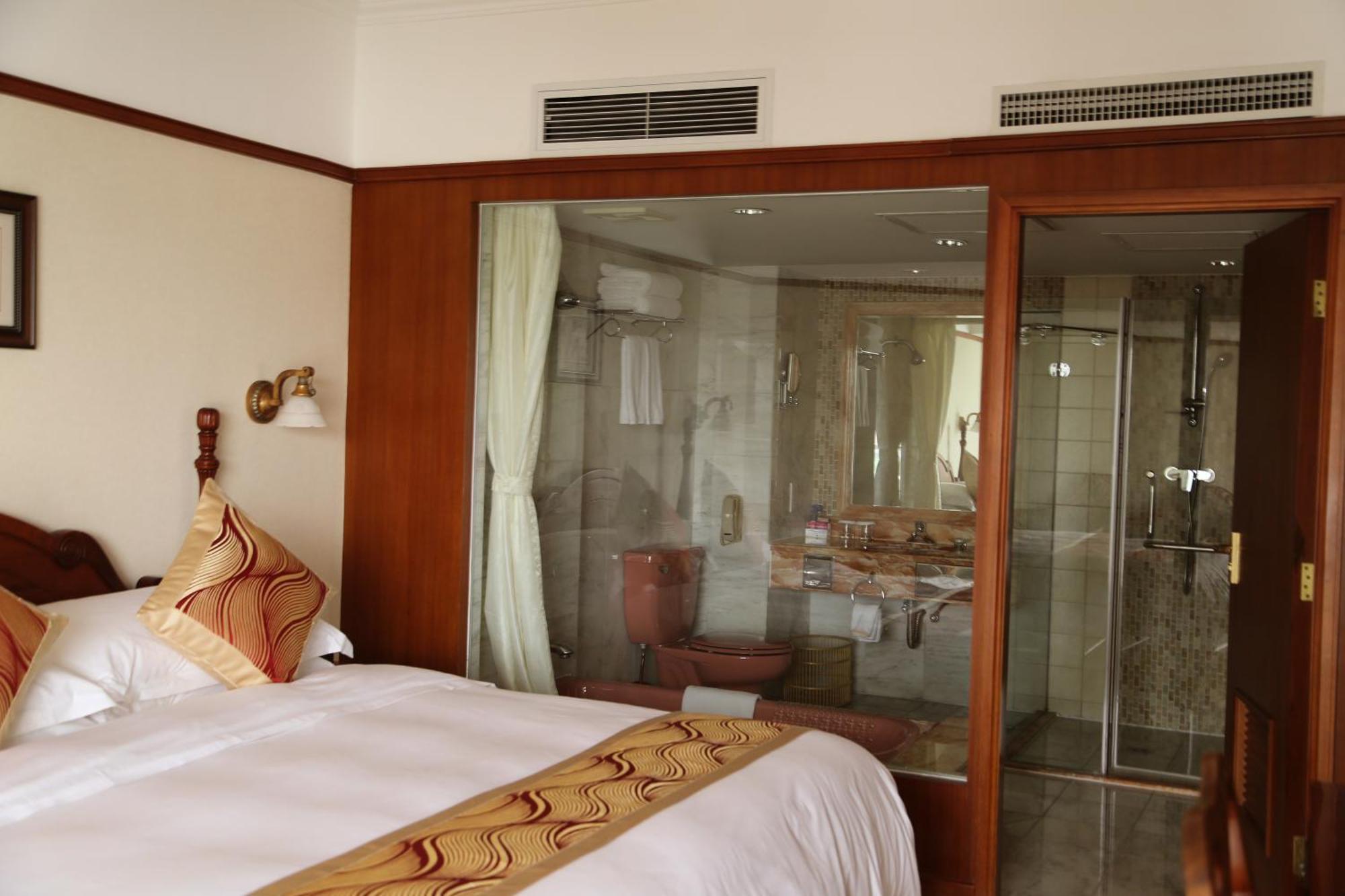 Huiquan Dynasty Hotel Ціндао Номер фото